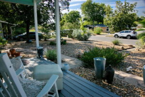 A relaxing view from the porch looking out into the yard.